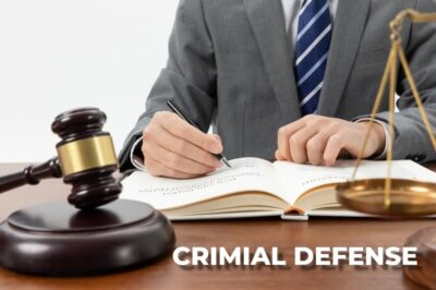 Criminal Defense Attorney reading law book